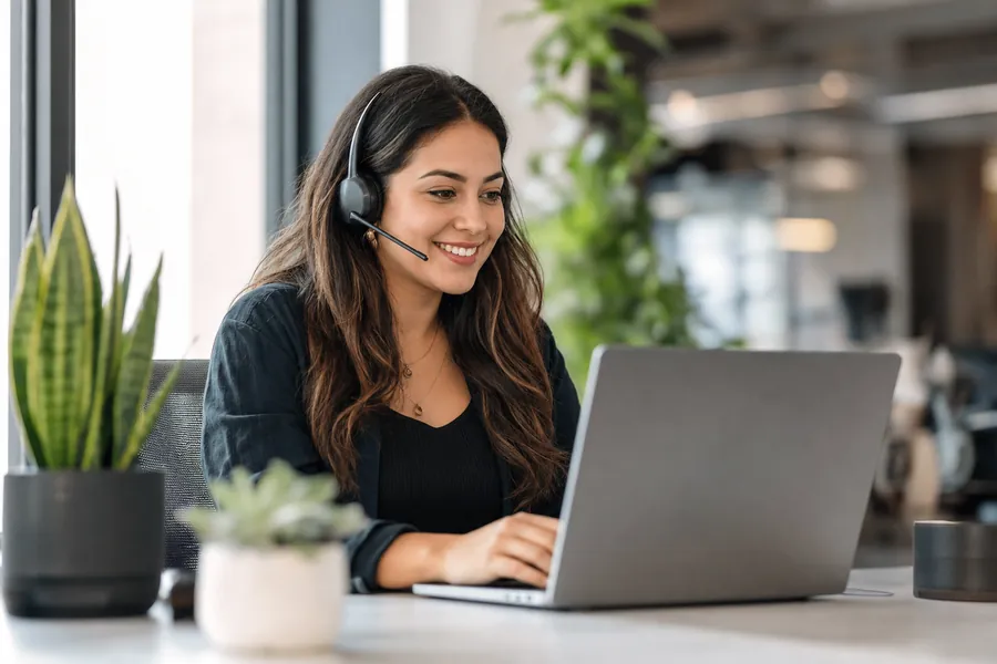 Community manager responding to customer messages on social