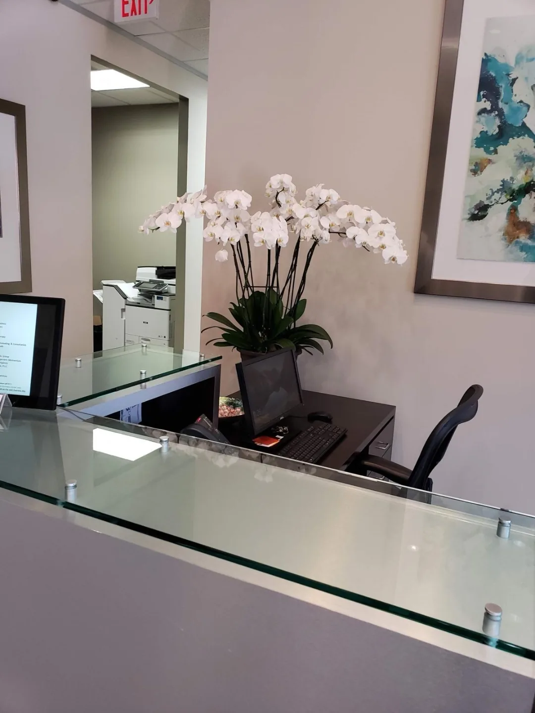 Front desk workstation at the Actual SEO Media, Inc. Katy office