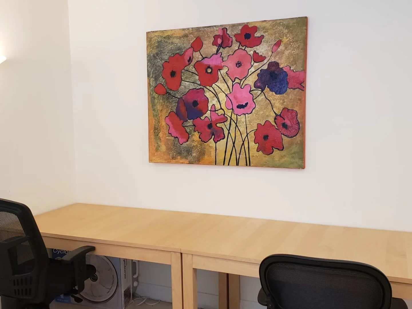 Private office with original artwork at the Actual SEO Media, Inc. Woodlands office